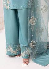 Teal traditional outfit with floral embroidery on a white background